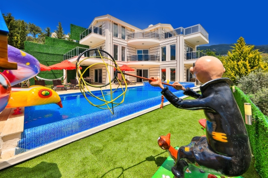 BLUE 7880 Kalkan İslamlar'da Muhafazakar Bahçeli Çocuk Oyun Alanlı Kiralık Tatil Villası